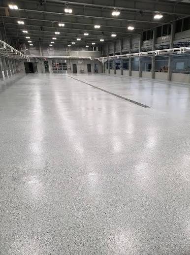 Large epoxy flake floor in an industrial facility