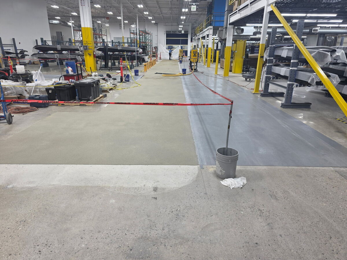 Facility floor coating mid-installation