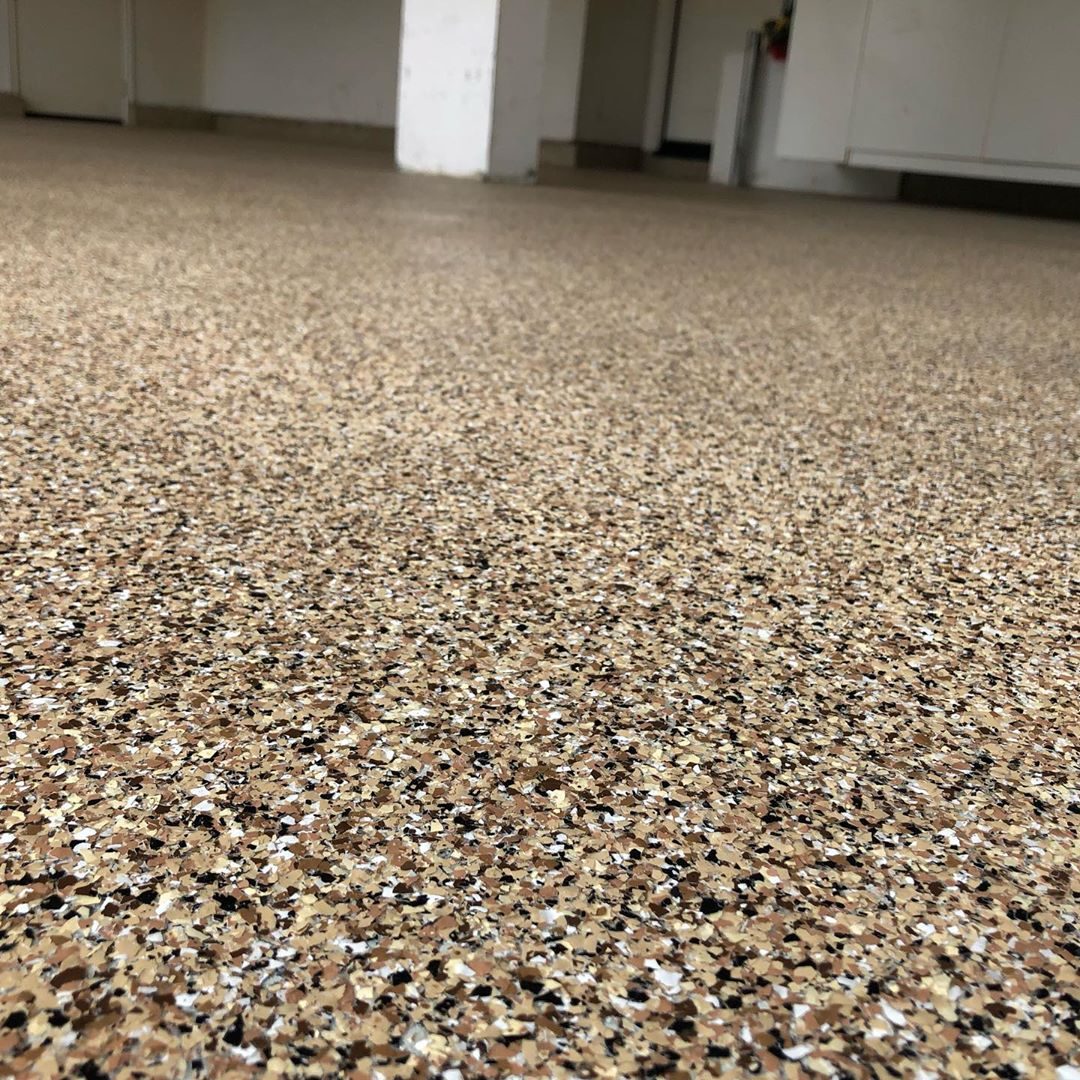 Tan and brown flake epoxy garage floor